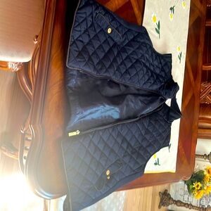 Cambridge Vest that is brand new. I am selling it because it does not fit me.